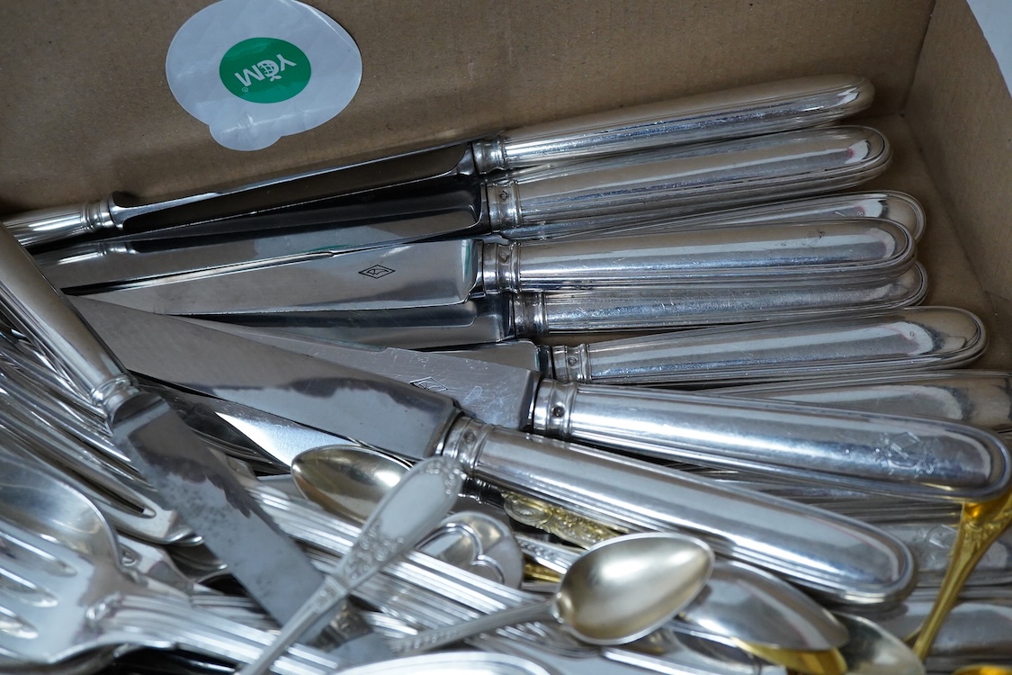 A set of eighteen early 20th century French 950 standard white metal handle steel table knives and thirteen dessert knives, by Emile Puiforcat, table knife 25.1cm, together with a small quantity of assorted plated flatwa